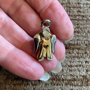 Vintage GCI guardian angel gold and silver tone pin